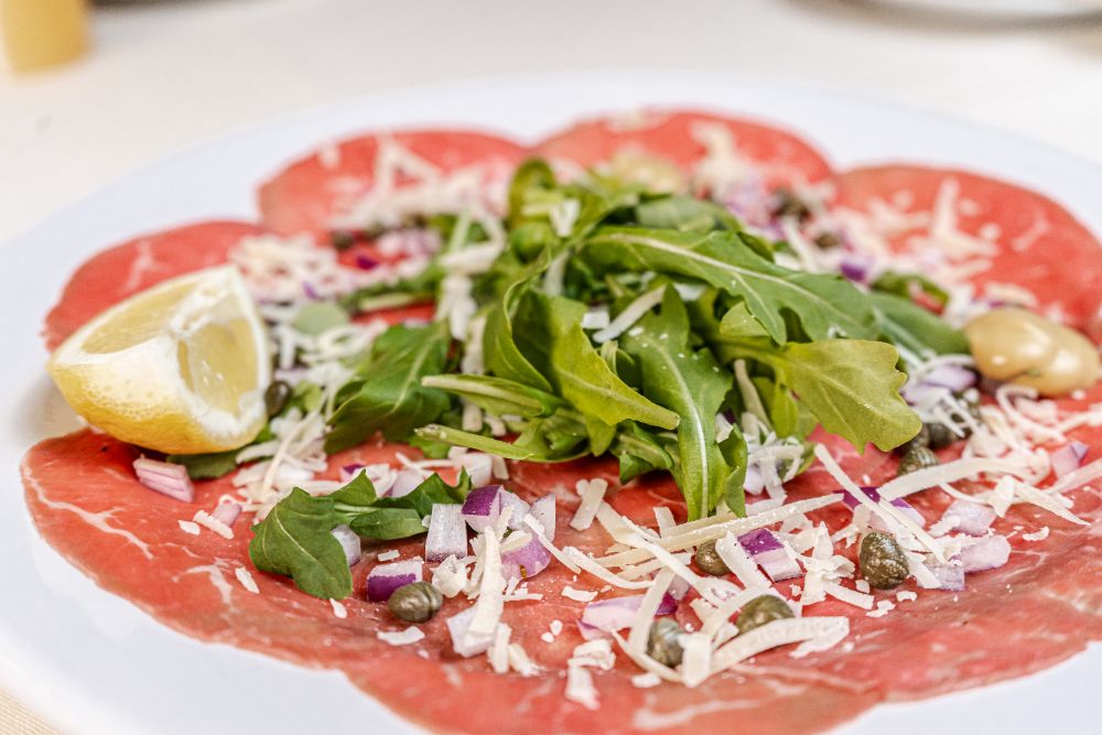 Beef carpaccio with arugula and capers