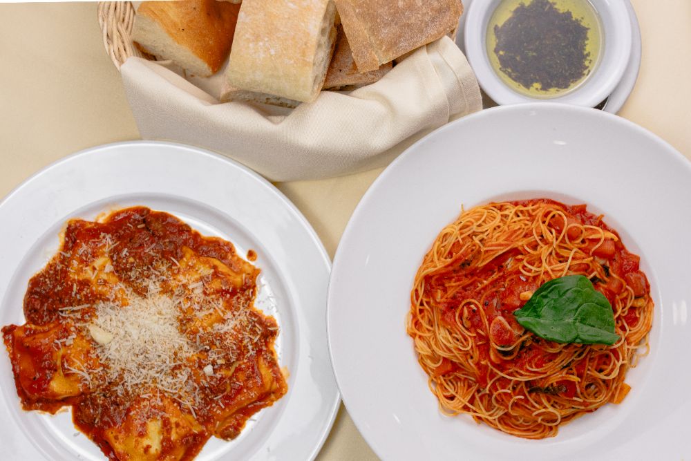 Ravioli and capellini pomodoro with bread